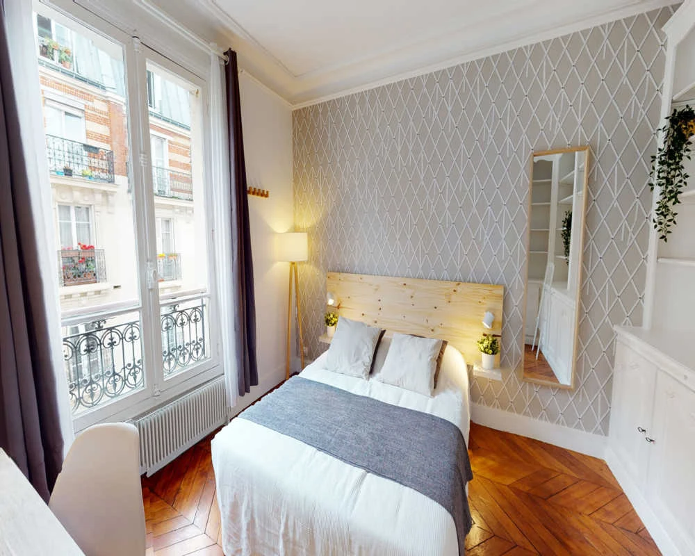 Photo de la colocation : Chambre en colocation de 8 à Paris - Confortable chambre individuelle